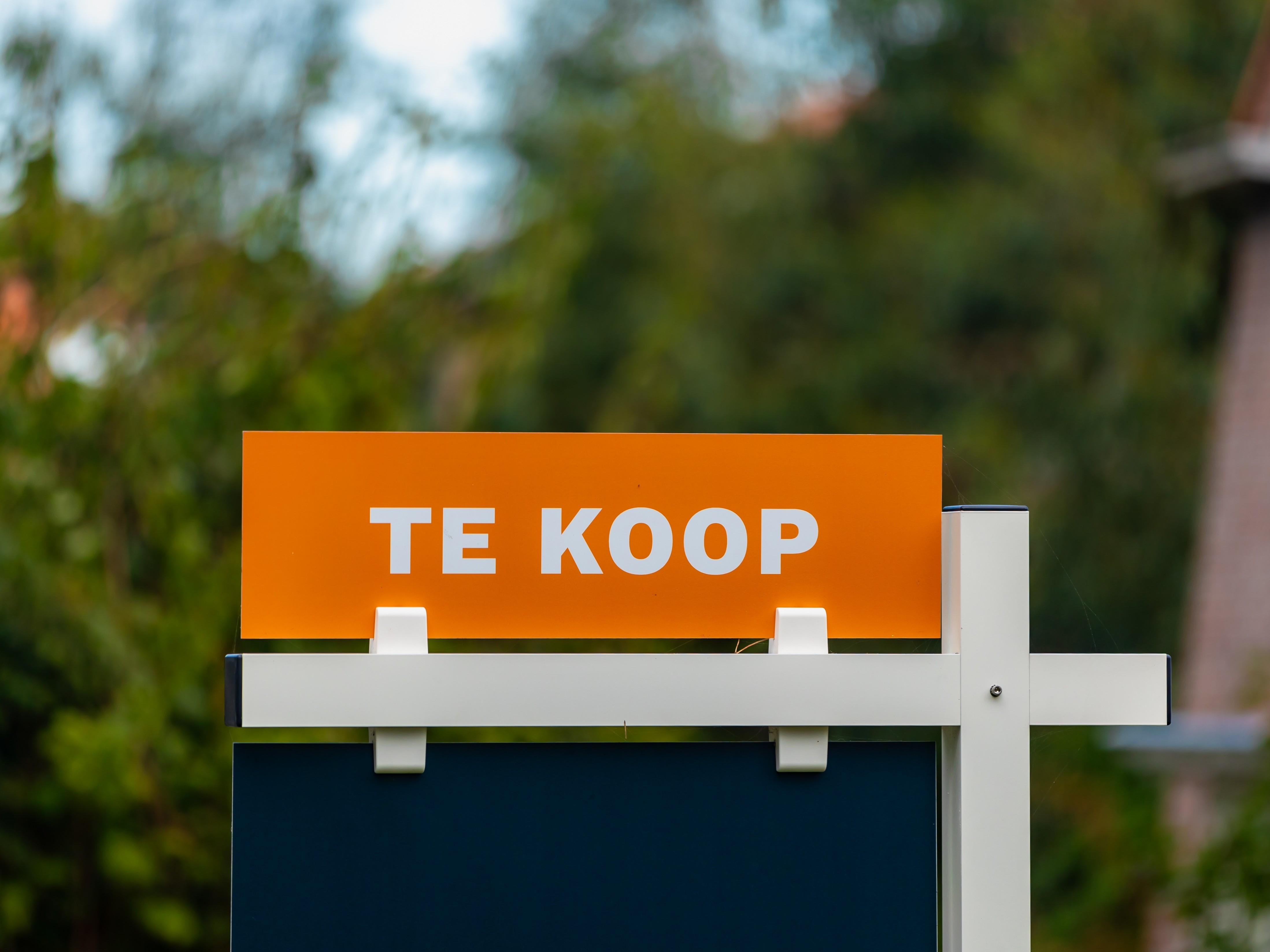 te koop bord huis
